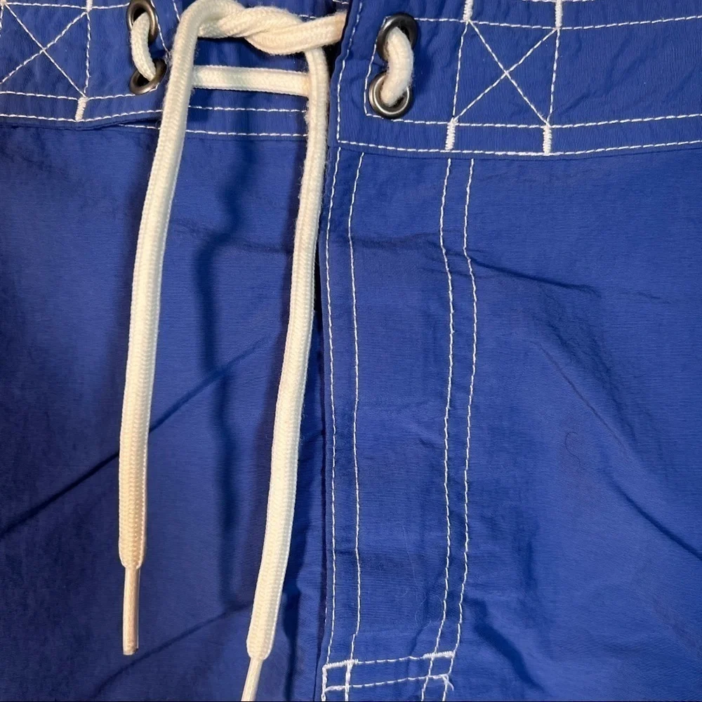 POLO RALPH LAUREN Swimwear. Blue w/cargo pocket, side pockets & key pocket. M